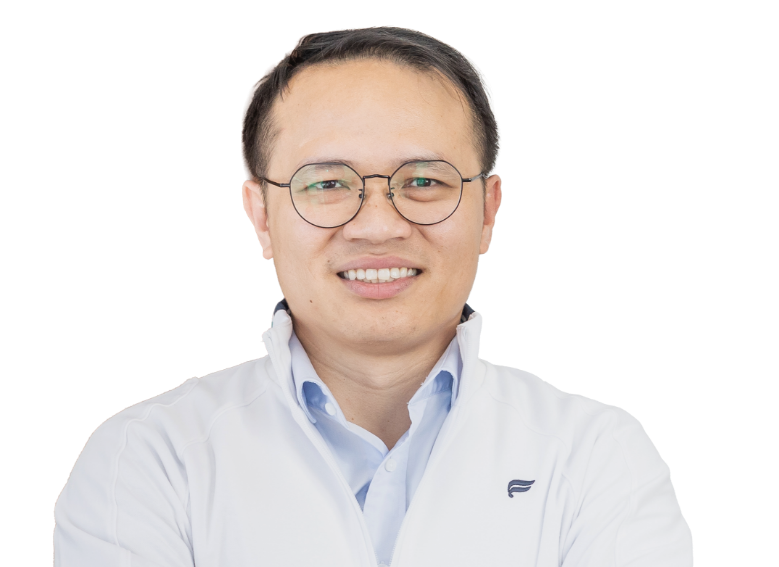 Grand Prairie dentist Doctor Ahn Vo smiling in a suit