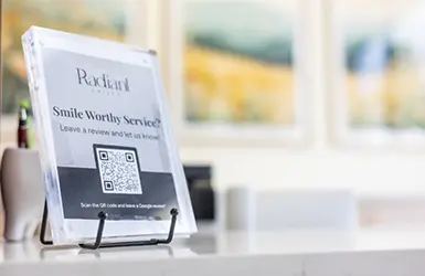 Person leaving a five star review on their phone